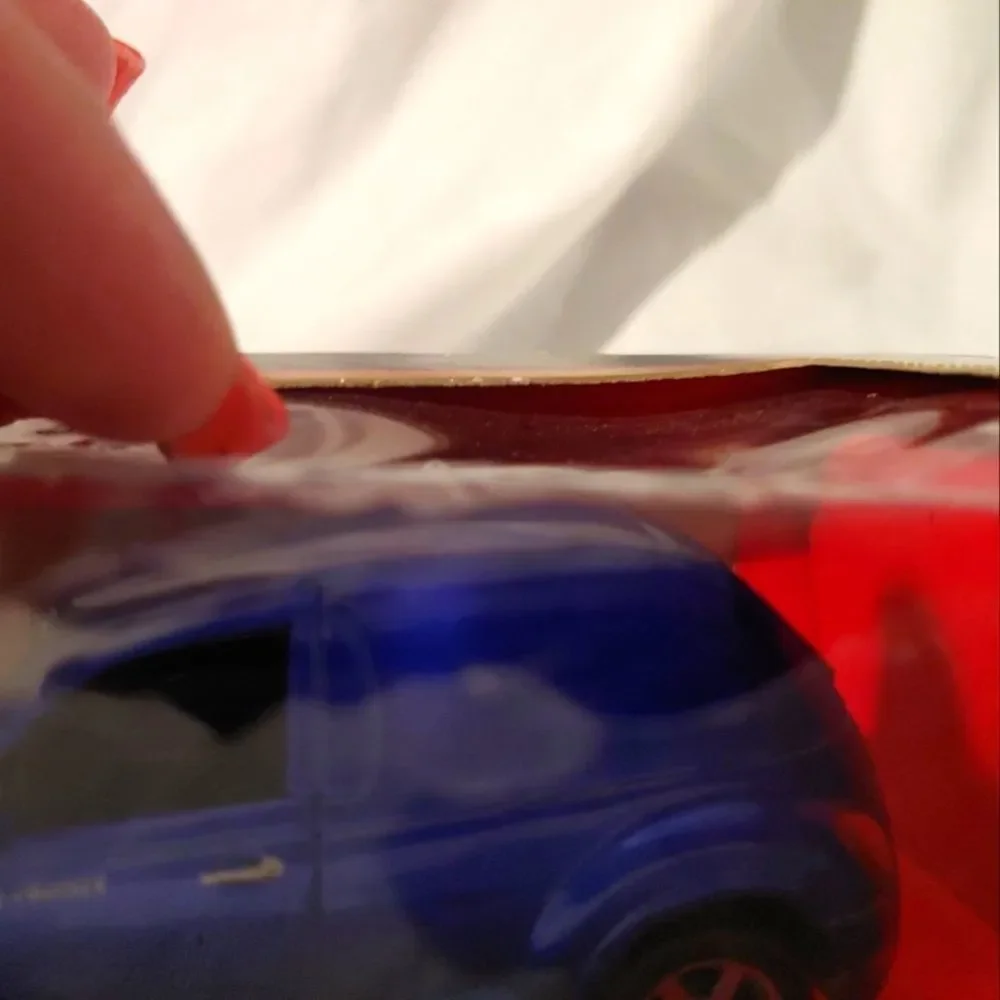2000 LIMITED EDITION BLUE CHRYSLER PANEL CRUISER 1/39 SCALE DIECAST CAR